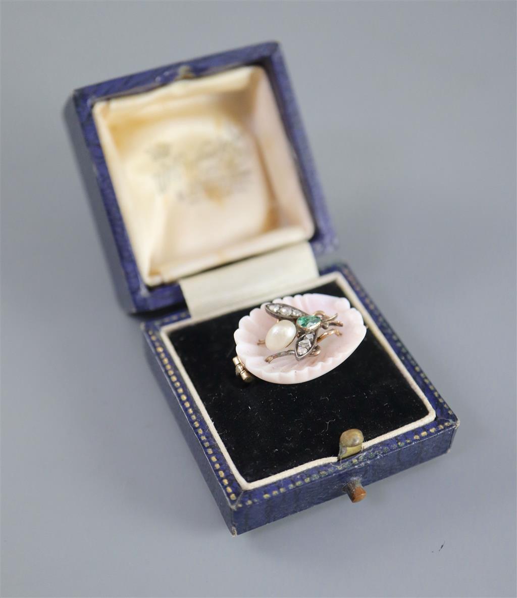 A late Victorian carved coral shell and inset pearl, emerald and rose cut diamond set bug brooch,